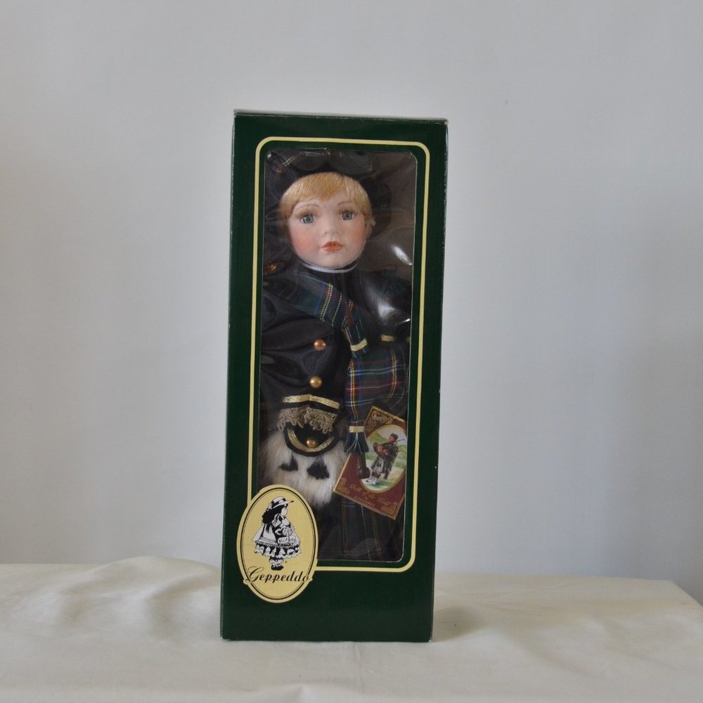 Geppeddo Porcelain Doll Bagpiper